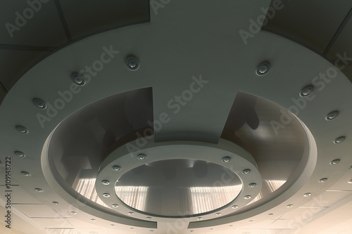 Layered ceiling with embedded lights and stretched ceiling inlay