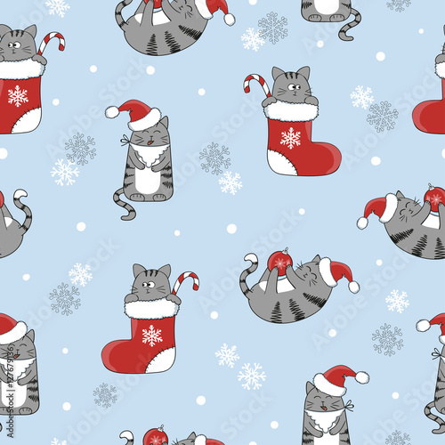 Christmas and New Year seamless pattern with cute cartoon cats. Vector holiday winter background. 
