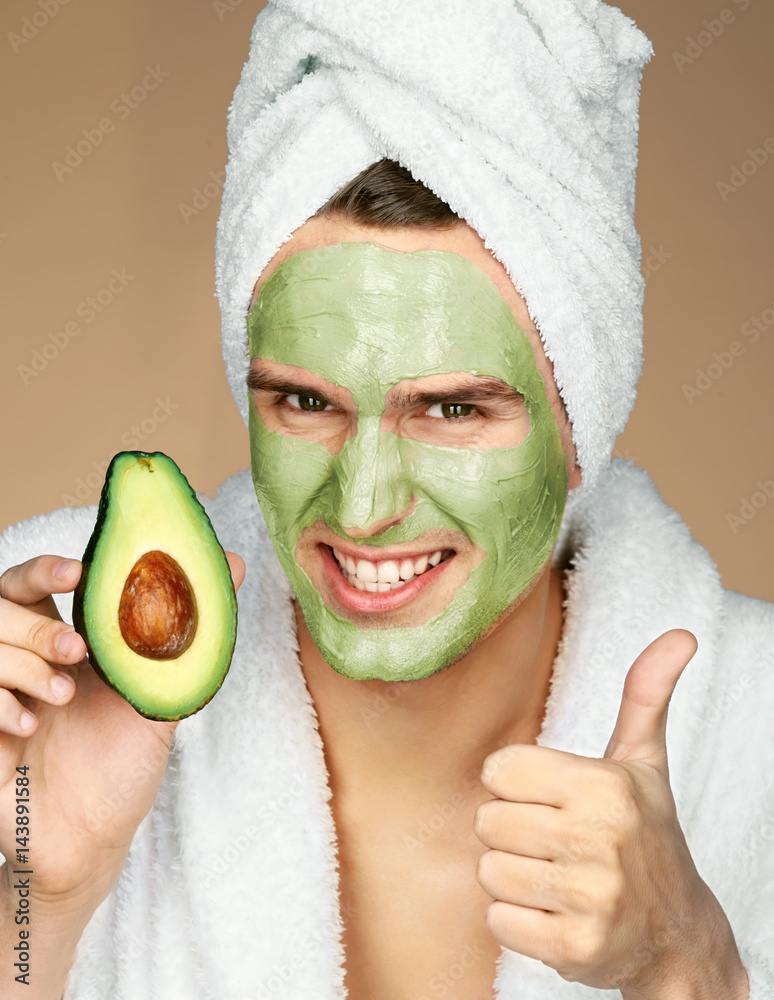 Man Wearing Avocado Face Mask And Showing Thumbs Up Portrait Of Happy