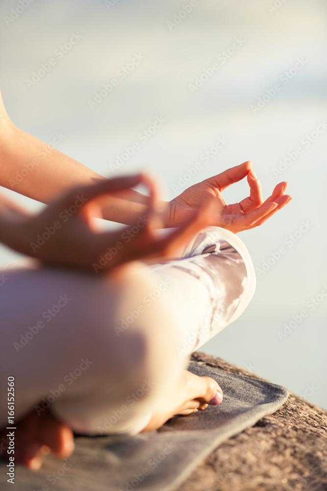 yoga woman meditating outdoors