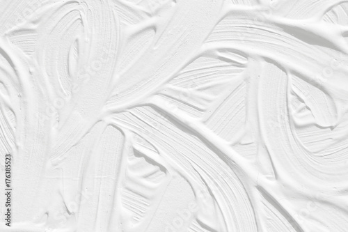 A white background with a wave pattern. Texture of the painted surface.