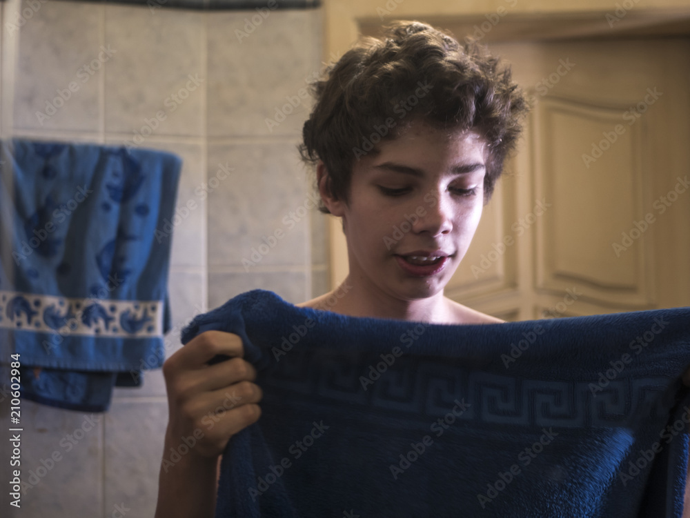 Naked Teenager Boy With Towel In Bathroom Feeling Sleepy In Front Of