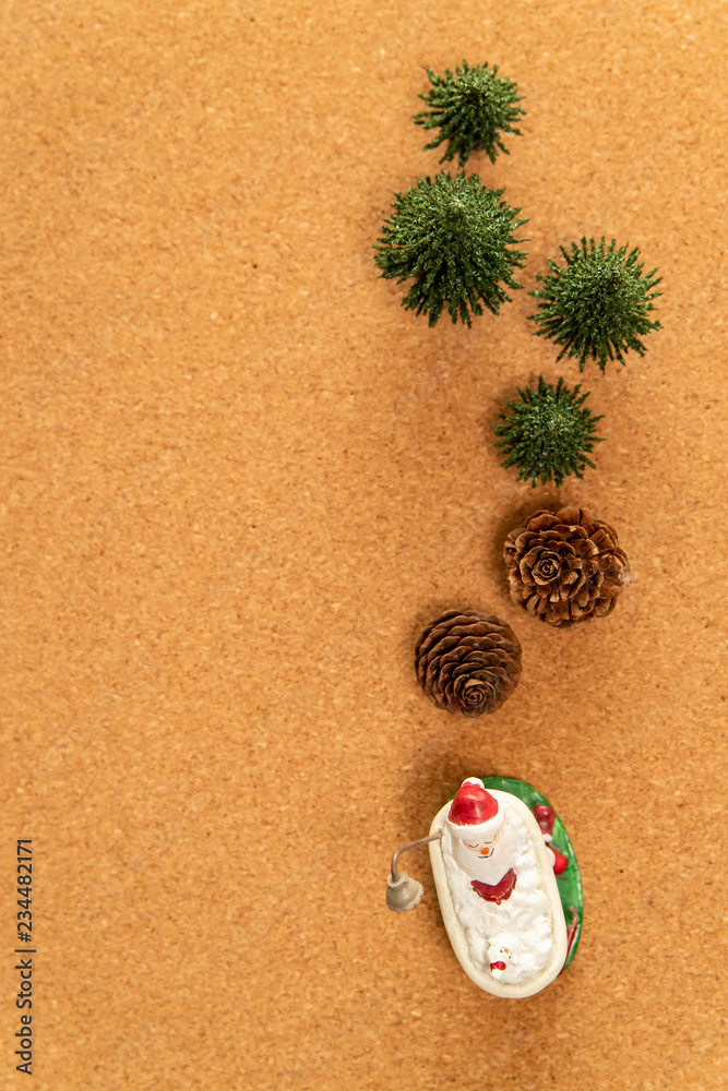 Green Christmas Tree With Pine Cone And Santa In Bathtub Stock Photo