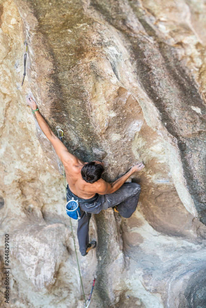 The Last Movements To Reach The Summit By A Male Climber Rock Climbing