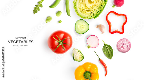 Creative layout made of summer vegetables. Food concept. Tomatoes, onion, cucumber, green peas, garlic, cabbage, chilly pepper, yellow pepper, salad leaves and radish on white background.