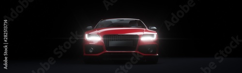Front view of red sports car with lights on.