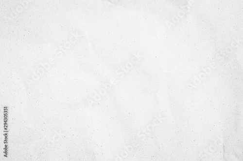 White recycled craft paper texture as background. Grey paper texture, Old vintage page or grunge vignette. Pattern rough art creased grunge letter. Hardboard with copy space for text.