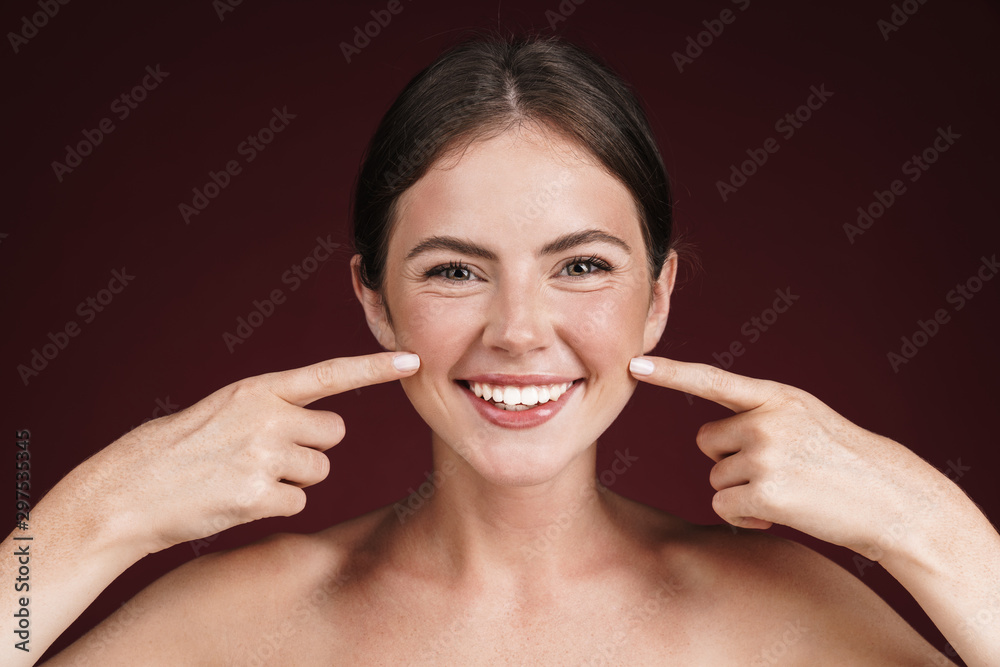 Image Of Half Naked Woman Smiling And Pointing Fingers At Her Cheeks Stock Photo Adobe Stock