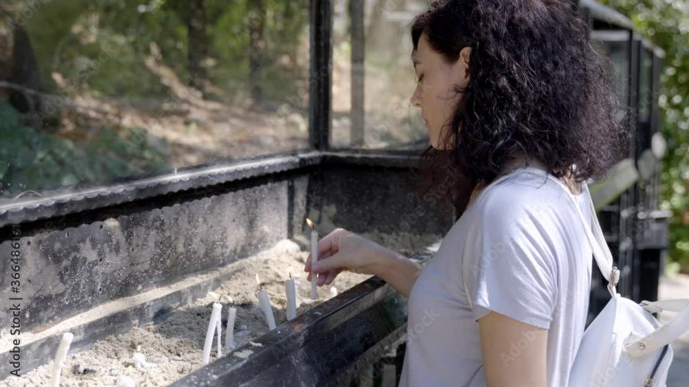 Vid O Stock Believing Woman Prays By Burning Candle Candle In Praying