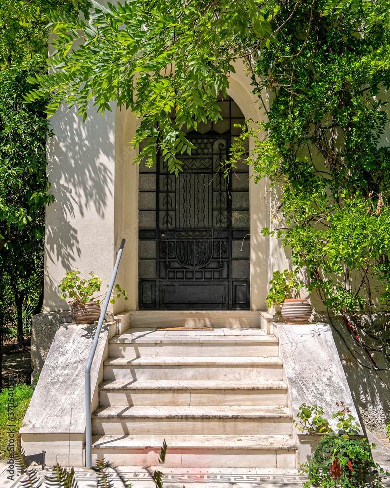 Classic Design House Facade With Marble Stairs Iron And Glass Entrance