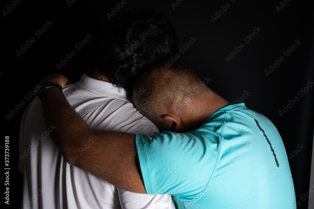 Interracial Gay Couple Hugging And Holding Each Other Stock Photo Adobe Stock