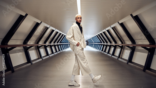 male fashion model posing in tunnel