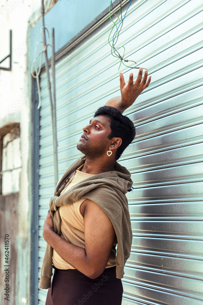 Portrait Of Dark Skinned Indian Man In Malaysia With Theatrical Facial