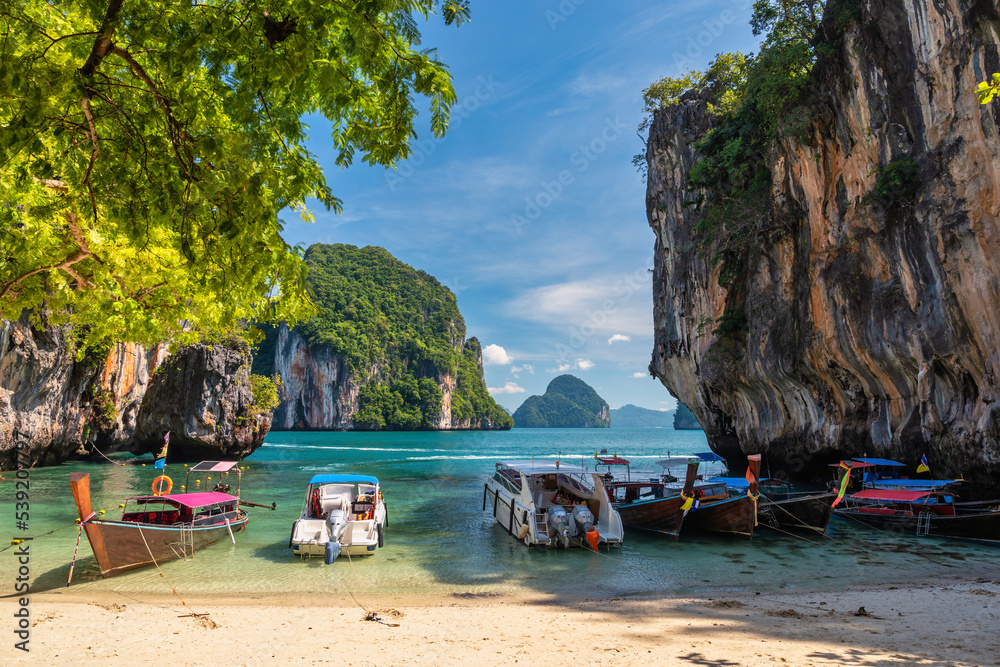 Tropical Islands View With Ocean Blue Sea Water And White Sand Beach At