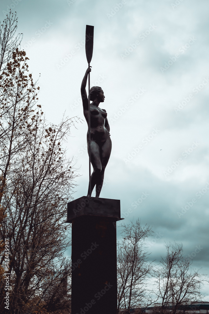 Modern Statue Of Naked Woman With A Paddle Stock Photo Adobe Stock