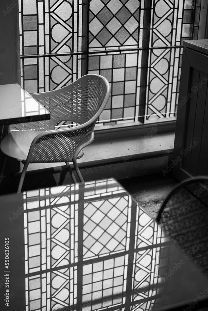 Stained Glass Windows Let Light Into A Cafe In A Deconsecrated