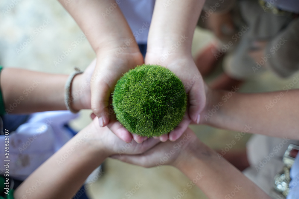 World Environment Day In Hand Holding Green Globe On Green Bokeh