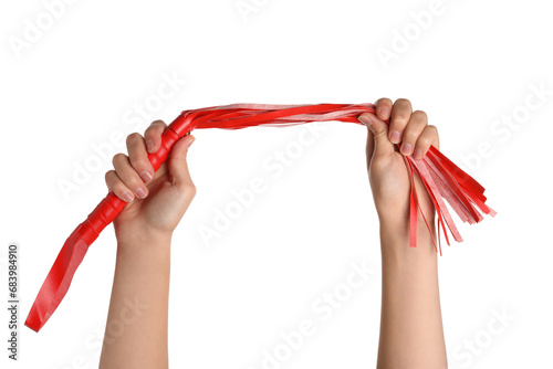 Female hands with whip from sex shop on white background, closeup