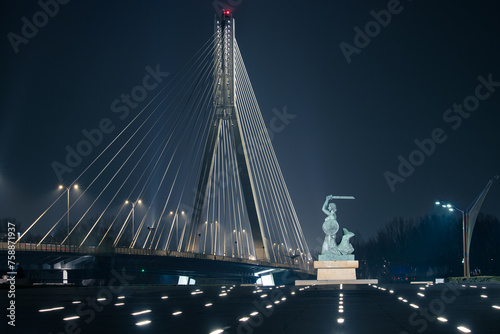 Bridge and the Mermaid of Warsaw at night