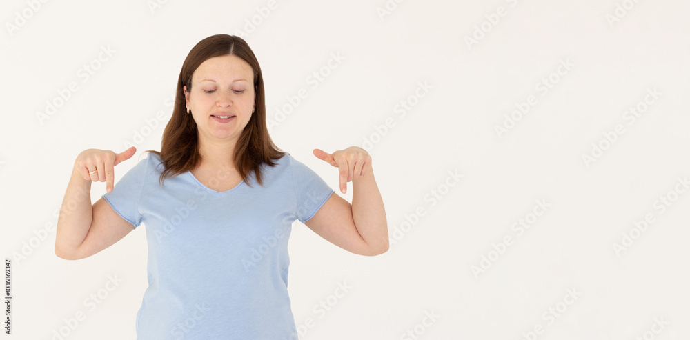 Excited Brunette Woman Checking Out Awesome News Pointing Fingers Down And Staring Amazed