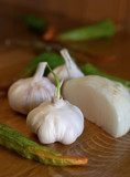 Fototapeta Miasto - garlic with onion and green chili peppers