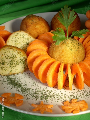 Potato Balls With Carrot Decorations Buy This Stock Photo And