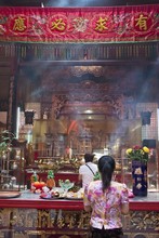 Asian Woman Praying