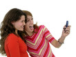 two girls taking a photo of themselves
