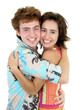 smiling young couple hugging