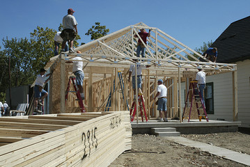 workers framing a house