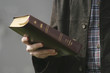 hand and bible