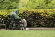 Homeless Man In Wheel Chair