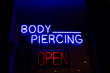 body piercing sign