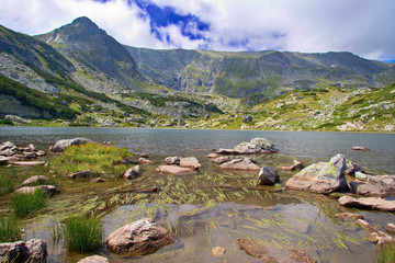 view of a glacial lake in national park rila, bulg