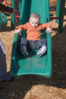 © Mehmet Dilsiz - little boy sliding