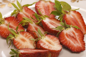 Wall Mural - slices of strawberry on a plate