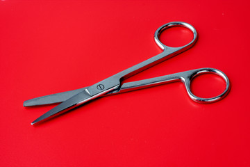 scissors on a red background