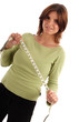 © bsilvia - stock photo of a woman holding measure tape