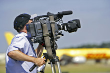 Cameraman At Open Air Event