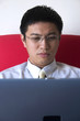 Leinwandbild Motiv young asian entrepreneur working with computer