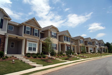 A Row Of New Townhouses Or Condominiums