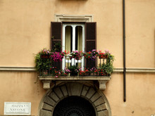 Balcony And A Gate In Rome