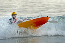 Kayaker In The Surf