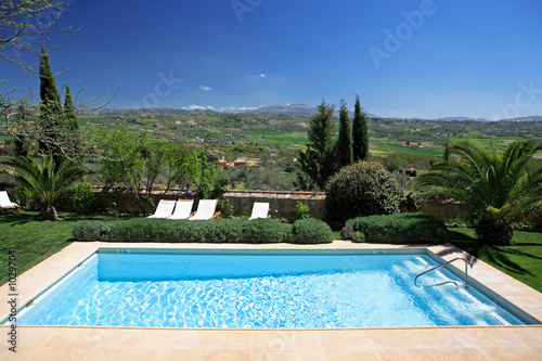 Fotografie, Obraz luxury rustic hotel and swimming pool in countryside