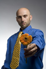 Businessman Giving Flower