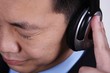 Leinwandbild Motiv asian businessman listening