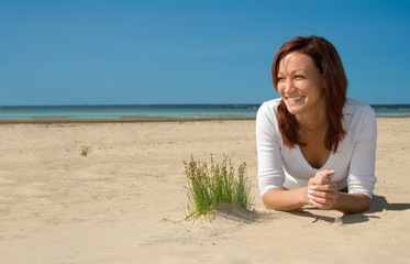 girl laying on a beach-6