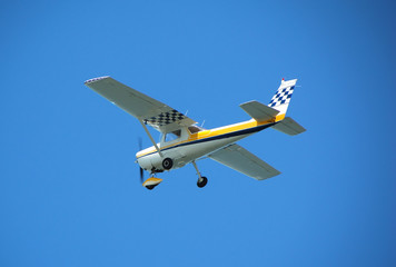 Wall Mural - light private plane in flight