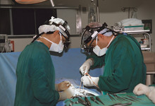 Two Surgeons Operating