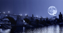 Huge Moon Over Charle's Bridge In Prague